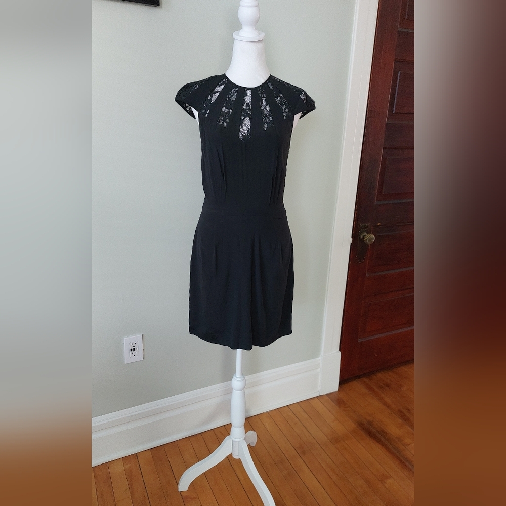 Black lace neckline cap sleeve dress